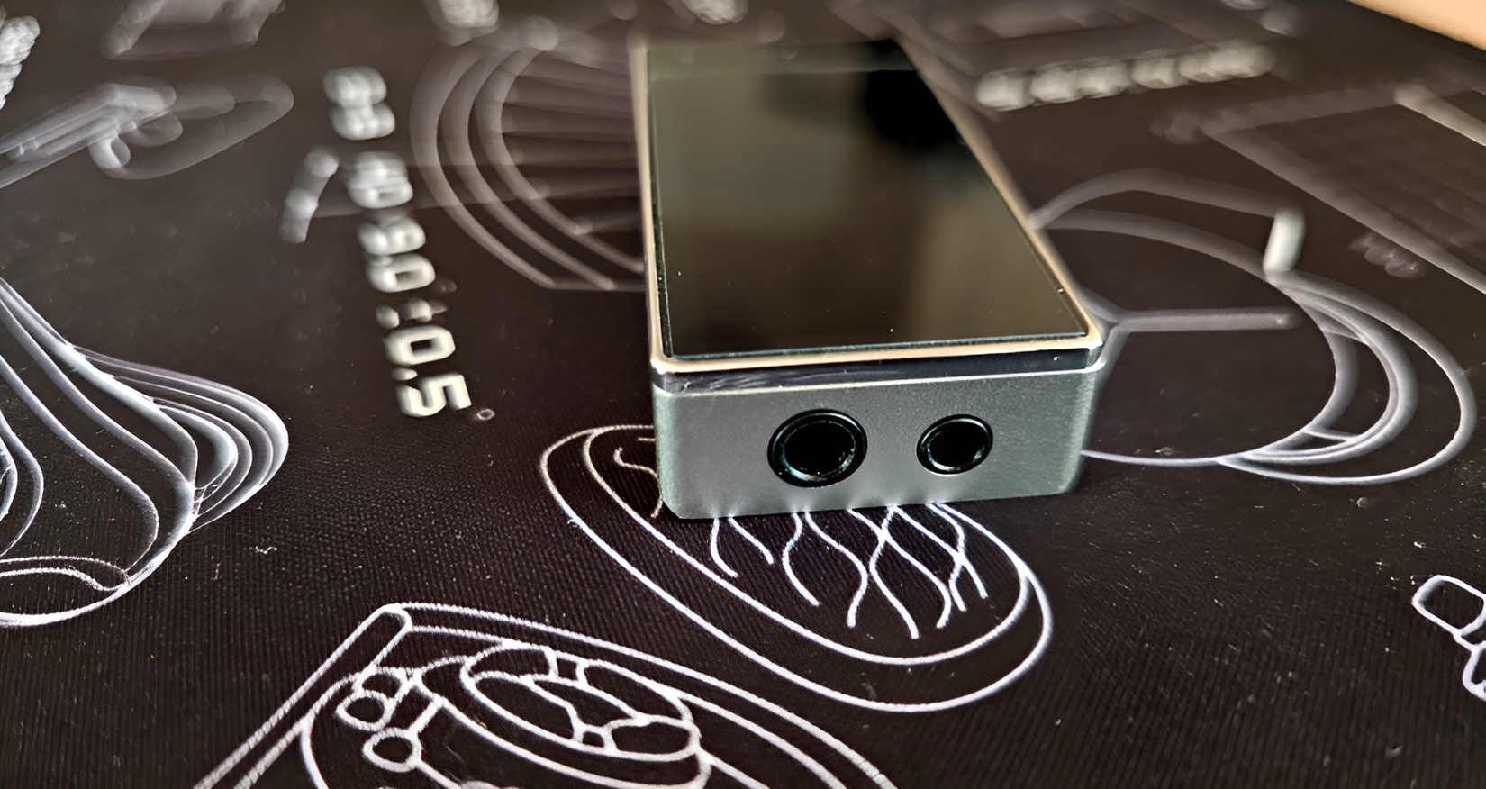 FiiO QX13 is presented as a regular USB-dongle, which implies its mobile use. 