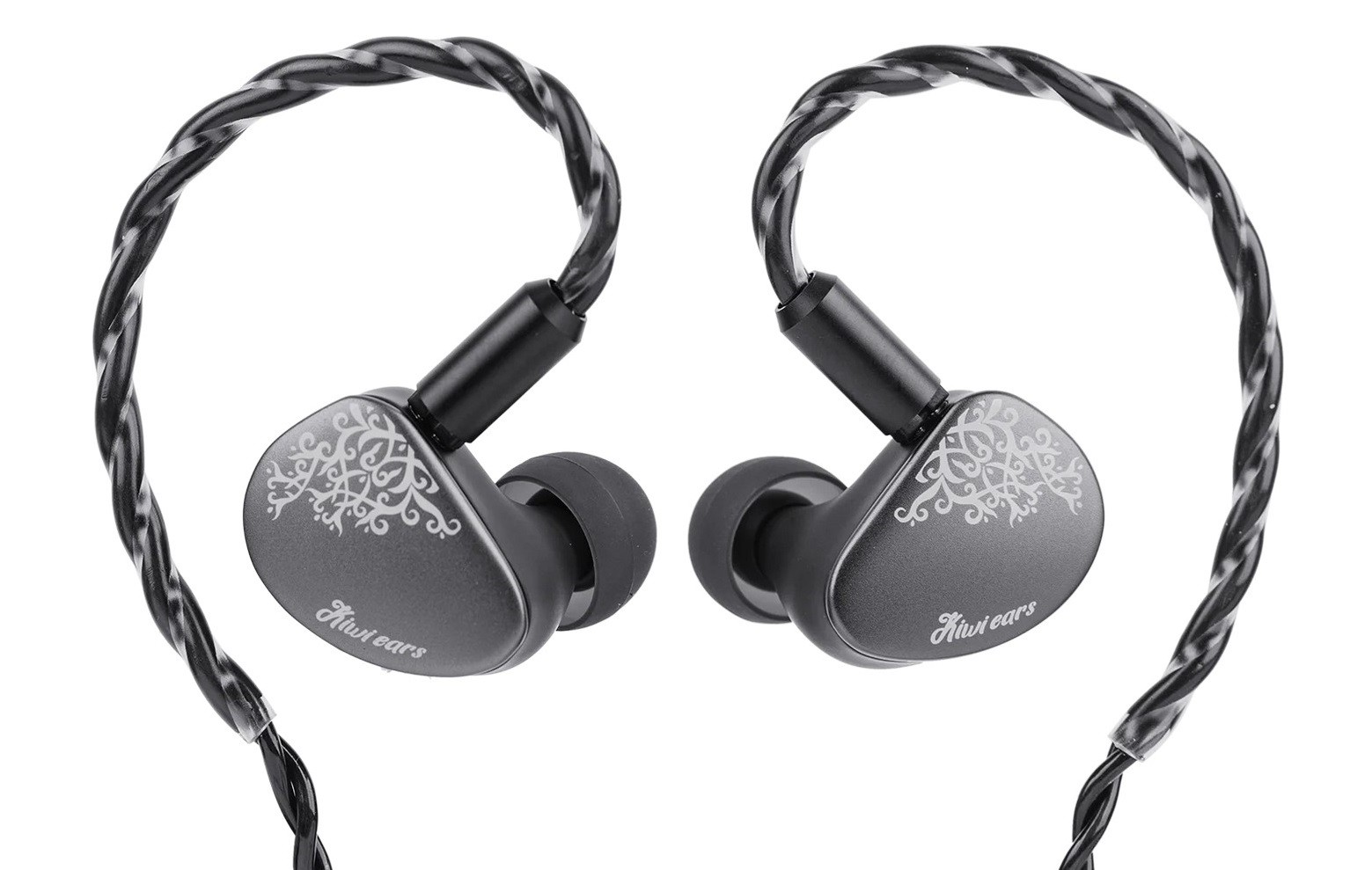 The housings are made of composite polycarbonate with a matte finish. The front panels are CNC-machined aluminum and feature a laser-engraved honeycomb pattern. The design is designed for long-term wear and a secure fit without excessive pressure.