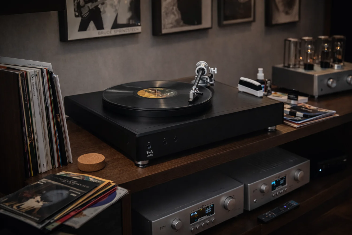 The T+A G 2000 R is a high-end belt-drive turntable from the prestigious R-Series, featuring a Clearaudio carbon tonearm, MC-2 moving-coil cartridge, DSP-controlled speed stabilization, and a 3.8 kg platter for precise, audiophile-grade vinyl playback.